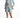 Model wearing Vera light blue high-waisted denim shorts with pleated front and cuffed hem, paired with a matching blazer.