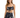 A model poses in a dark patterned two-piece outfit featuring a knotted crop top and a matching wrap skirt.