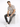 A man sits on a white cube wearing a short-sleeve striped shirt with beige, blue, and brown tones, paired with gray j...