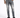 A person stands wearing distressed gray jeans and black sneakers, showcasing a casual, modern style.