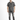 A man stands wearing a short-sleeve black and white checkered shirt paired with distressed gray jeans and black sneak...
