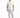 A man stands confidently in a white t-shirt with a textured graphic, paired with light gray pants and white sneakers.