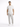 A man stands confidently in a white t-shirt with a textured graphic, paired with light gray pants and white sneakers.