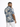 A man wearing a short-sleeve shirt with a blue and beige abstract pattern, standing with his back to the camera.