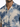 Short-sleeve shirt featuring a textured blue and beige abstract pattern with a button-down front.