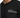 A close-up of a black T-shirt featuring white text that reads "Life Is An Unpredictable Game" on the chest.