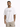 A man wearing a white oversized t-shirt with a handwritten-style graphic, paired with beige cargo shorts.