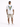 A person stands with their back to the camera, wearing a white shirt featuring a colorful eagle graphic and beige car...