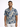 Short-sleeve shirt featuring a blue and beige abstract pattern, worn by a man with a neutral expression.