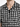 Short-sleeve shirt featuring a black and white grid pattern with a classic collar and button closure.