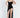 Kennedy black glitter dress featuring a sweetheart neckline, thin straps, and a high-slit skirt over mini shorts.