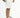 Man in Louie Shorts Set featuring white ribbed fabric, casual summer two-piece outfit with white and black sneakers.