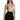 Model in Harmoni seamless carbon tie-dye bodysuit and high-waisted black denim shorts, chic aesthetic OOTD.