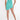 Back view of the Greta Green Sparkle Mini Dress featuring a ribbed knit, bodycon fit, and asymmetrical hemline.