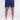 Model wearing navy blue Dream Shorts Set with yellow ornate tile-pattern trim and drawstring waist by Carbon Jeans.