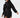 A model showcases a black hooded dress with a unique hemline and relaxed fit, emphasizing comfort and style.