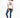 Woman in a More Love white graphic streetwear t-shirt, slim-fit blue jeans, and white sneakers.