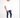 Model wearing white oversized Les Benjamins streetwear graphic tee with logo and distressed blue skinny jeans.
