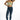 Model in Aylin high-waisted blue distressed skinny jeans with a vintage wash and slim fit against a white background.