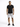 A man stands confidently in a fitted black t-shirt and distressed gray shorts, paired with black sneakers.