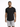 A man wearing a fitted black t-shirt and light gray shorts stands against a plain white background.