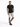 A man stands confidently in a fitted black t-shirt and distressed gray shorts, paired with black sneakers.