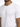 Close-up of a man wearing a plain white crew neck t-shirt, showcasing a relaxed fit and soft fabric texture.