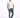 A man stands confidently in a fitted white t-shirt and distressed blue jeans, paired with white sneakers.
