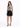 A model poses in a fitted long-sleeve top featuring graphic designs, paired with a black zippered skirt and heels.