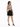 A woman with long hair wears a sheer long-sleeve top featuring tattoo designs, paired with a black skirt and heels.