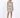 A model poses in a shimmering silver dress with a cutout design and strappy heels, showcasing a stylish look.