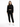 A model wearing a black cropped hoodie and matching joggers, paired with white sneakers, standing against a plain bac...