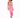 A model poses in a pink two-piece outfit featuring a cropped top and a midi skirt with a side slit.