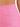 Close-up of a pink apparel item showcasing a smooth texture and tailored seams.