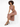A model sits elegantly on a white pedestal, wearing a fitted, sleeveless dress with a thigh-high slit and strappy heels.