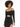 A model showcases a black off-shoulder top with a twist detail and a cutout, paired with a matching skirt.