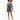 A model poses in a fitted black and white tie-dye dress with long sleeves and a ruched design.