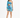 A model poses in a vibrant blue and teal one-shoulder dress with a fitted silhouette and ruched detailing.