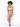A model poses on a stool wearing a floral crop top and matching skirt, showcasing vibrant tropical patterns.