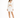 A model poses in a white cut-out dress with long sleeves and a fitted silhouette, paired with black strappy heels.