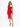 A model poses in a red, one-shoulder dress with a thigh-high slit and ruched detailing, paired with black heels.