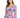 A woman models a colorful floral dress with long sleeves and a tie-front detail, featuring vibrant pink, blue, and ye...