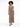 A model poses in a leopard print maxi dress with a thigh-high slit and strappy sandals.