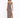 A model poses in a leopard print maxi dress with a thigh-high slit and spaghetti straps, showcasing a stylish look.