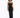 A model poses in a black, sparkly dress with cut-out details and thin straps, showcasing a stylish silhouette.