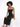 A model poses in a black, sparkly dress with cut-out details, showcasing a stylish and modern design.