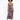 A model poses in a fitted, floral-patterned dress with a thigh-high slit and spaghetti straps.