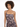 A model poses in a one-shoulder dress featuring a floral pattern in soft pink and black hues.
