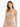 A model poses in a strapless, sparkly beige dress featuring a cut-out design and a knotted detail at the waist.