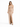 A model poses in a strapless, shimmering beige dress with a cutout design and a thigh-high slit.